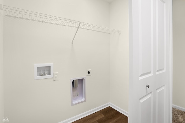 clothes washing area featuring baseboards, washer hookup, laundry area, dark wood-style floors, and electric dryer hookup