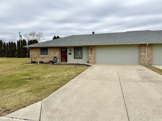 ranch-style home with a garage, driveway, a front lawn, and brick siding