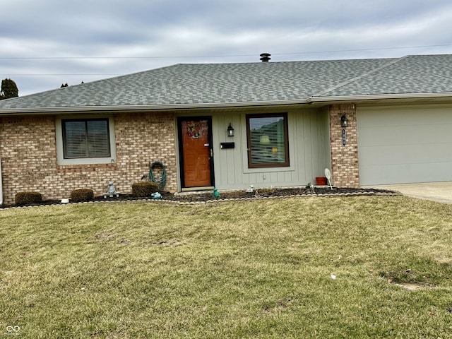 ranch-style home with a shingled roof, a garage, driveway, and a front lawn