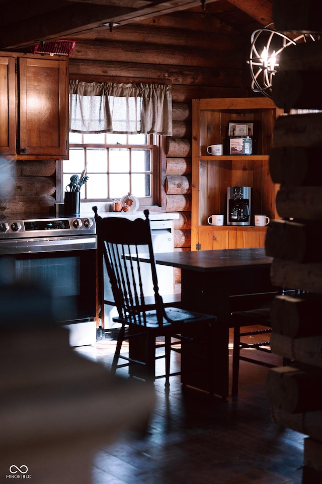 kitchen with decorative backsplash, stainless steel range with electric cooktop, log walls, and dark wood-style flooring