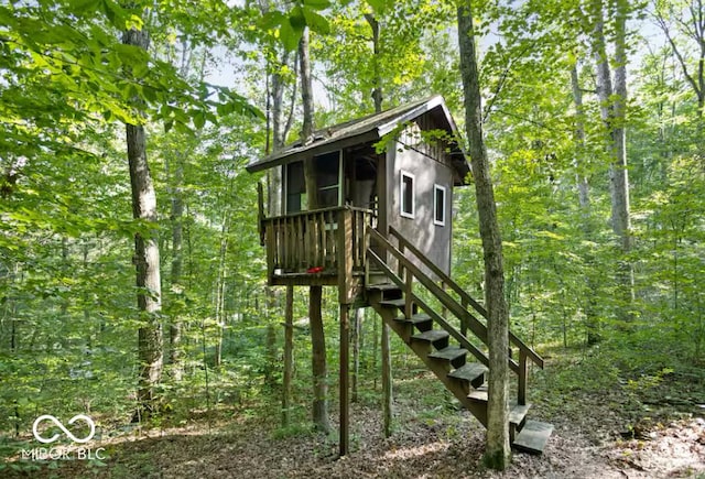 details with stairs and a forest view