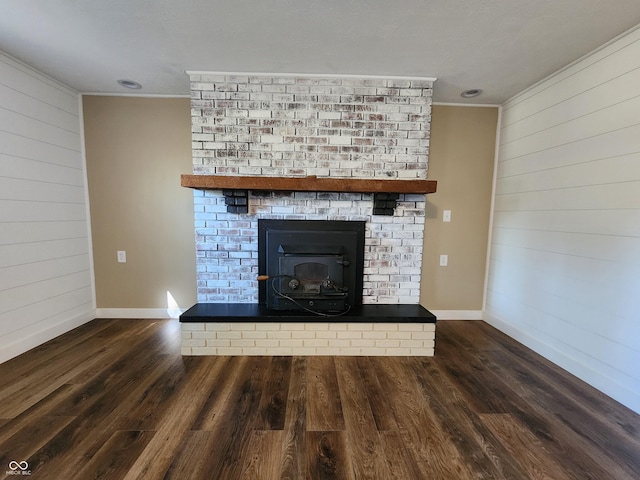 interior details with ornamental molding, wood finished floors, and baseboards