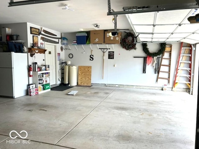 936 Plunkett Ave, Westfield, IN 46074 - garage with freestanding refrigerator