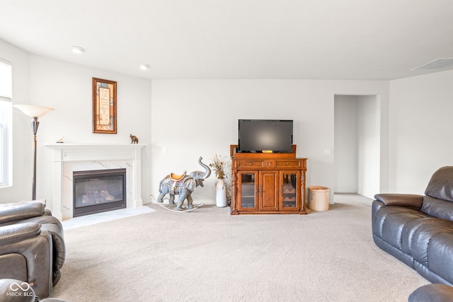 936 Plunkett Ave, Westfield, IN 46074 - carpeted living area featuring a high end fireplace and recessed lighting