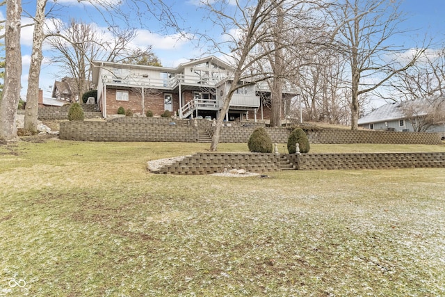 view of yard with stairs and a deck