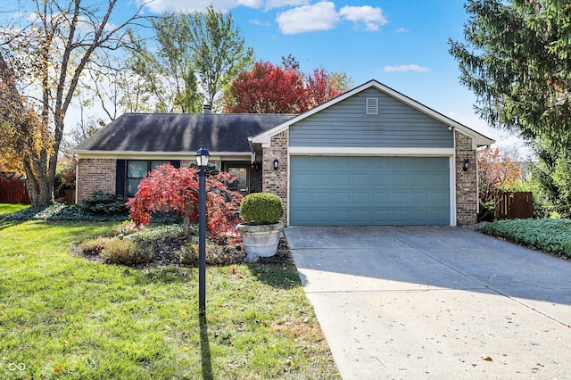 single story home with concrete driveway, an attached garage, brick siding, and a front lawn