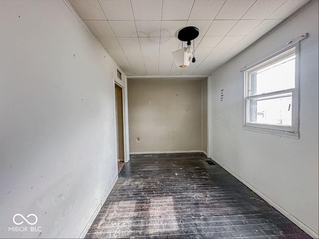 interior space featuring wood finished floors and visible vents