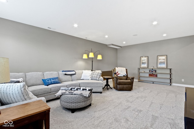 living room with visible vents, recessed lighting, carpet, and baseboards