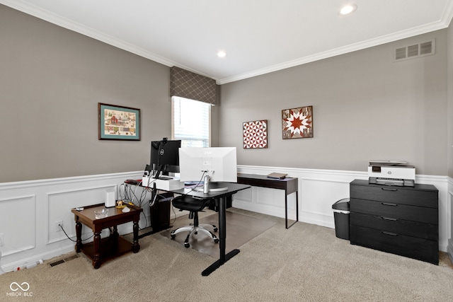 home office featuring visible vents, a wainscoted wall, carpet, and ornamental molding