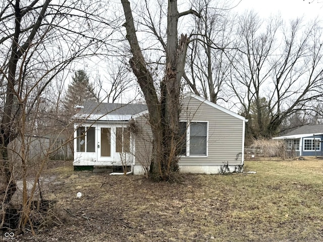 exterior space with a lawn