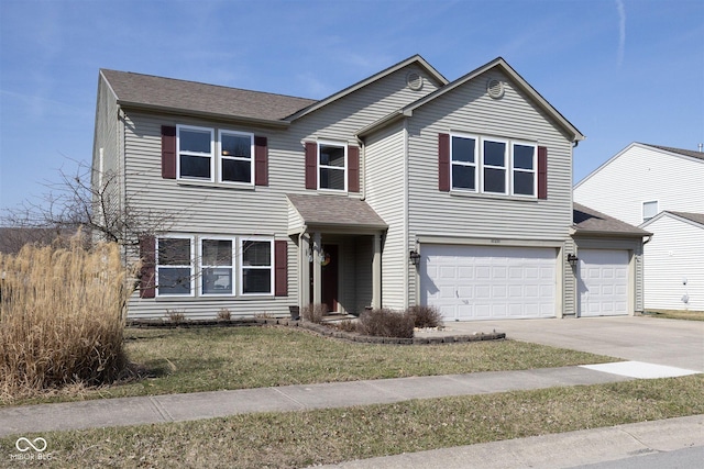 traditional-style house featuring a garage, roof with shingles, concrete driveway, and a front lawn