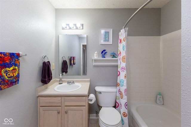 bathroom with shower / bath combo with shower curtain, toilet, vanity, and a textured ceiling