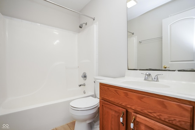 bathroom featuring toilet,  shower combination, and vanity