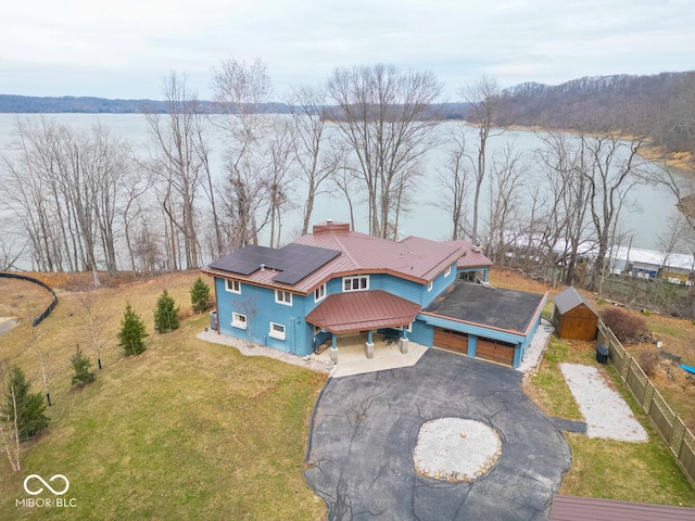 aerial view featuring a water view