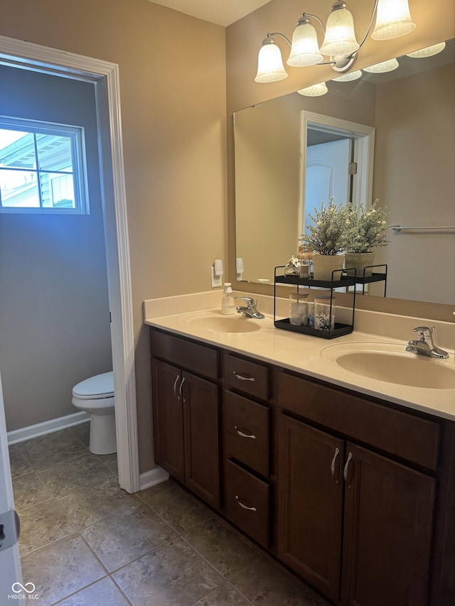 14309 Shooting Star Dr, Noblesville, IN 46060 - full bathroom with double vanity and a chandelier