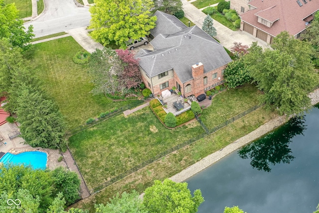 bird's eye view with a water view