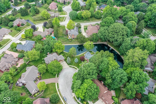 bird's eye view featuring a residential view and a water view