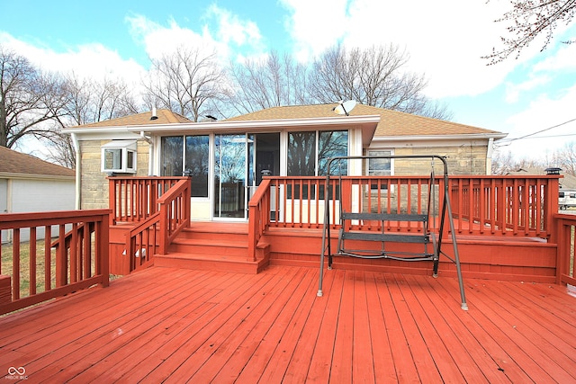 wooden terrace featuring a sunroom