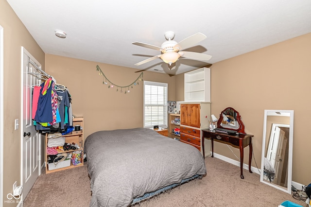 bedroom with baseboards, ceiling fan, and carpet flooring