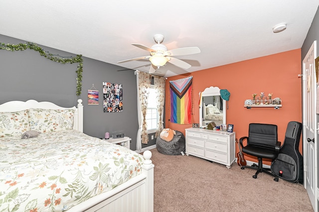 bedroom featuring light carpet and ceiling fan