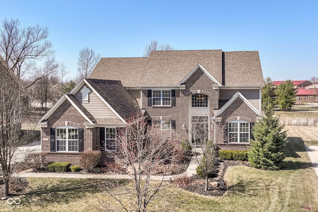 view of front of property with brick siding