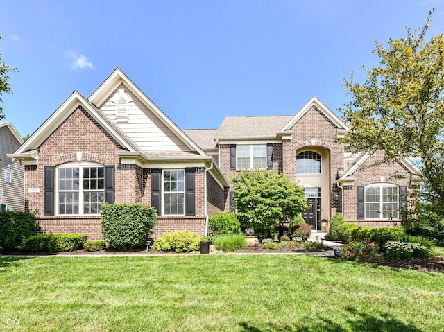 14034 Wicklow Ln, Fishers, IN 46040 - traditional home with brick siding and a front lawn