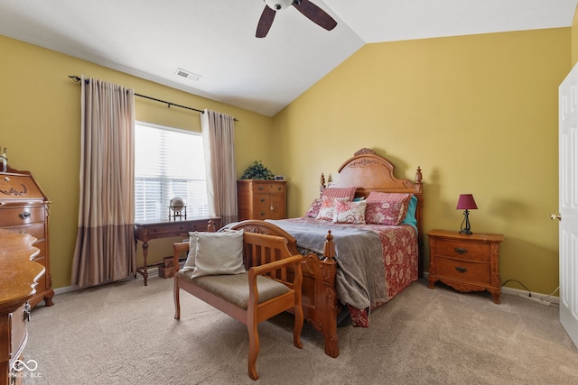 bedroom featuring ceiling fan, carpet flooring, visible vents, baseboards, and vaulted ceiling