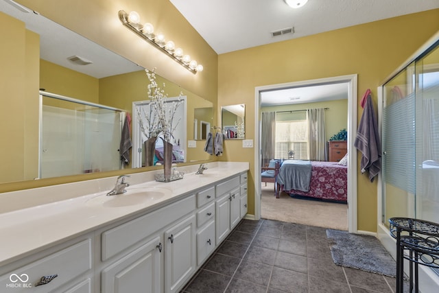 bathroom with ensuite bath, visible vents, a sink, and a shower stall