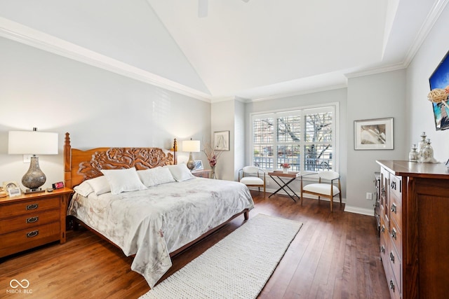 bedroom with hardwood / wood-style floors, a ceiling fan, baseboards, lofted ceiling, and crown molding