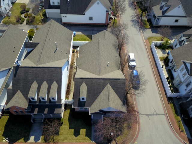 birds eye view of property with a residential view