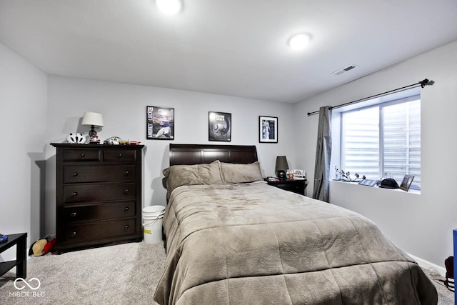 bedroom with carpet and visible vents