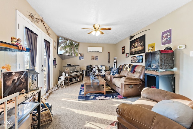 living area featuring a ceiling fan, carpet, an AC wall unit, and a textured ceiling