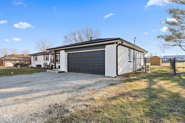 garage with fence