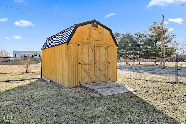 view of shed with fence