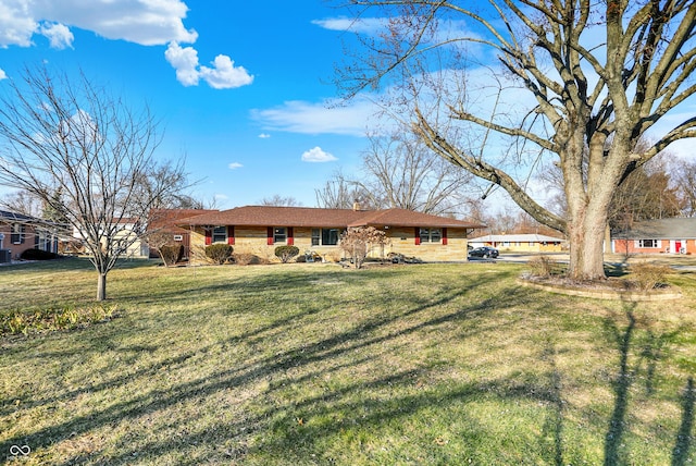 view of front of home with a front lawn