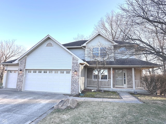 traditional home with covered porch, brick siding, driveway, and an attached garage