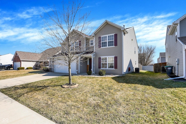 traditional home with cooling unit, concrete driveway, a front yard, and fence