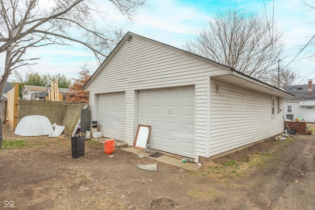 detached garage with fence