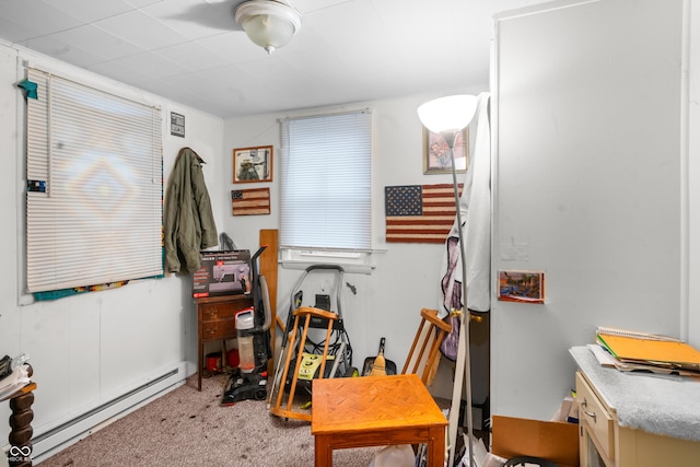 interior space featuring a baseboard radiator and carpet flooring