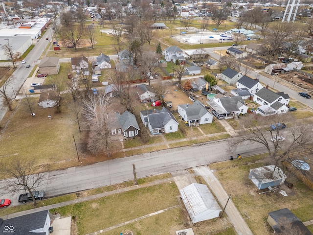 birds eye view of property with a residential view