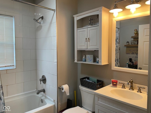 bathroom with toilet, vanity, and shower / bathtub combination with curtain