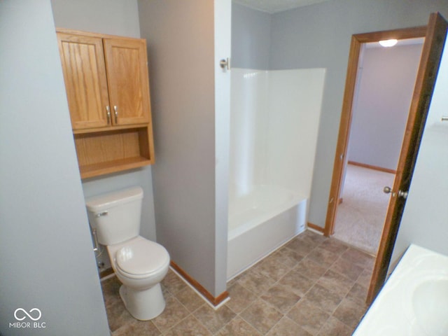 full bathroom with a bathtub, baseboards, toilet, and walk in shower