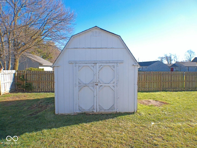 view of shed with a fenced backyard