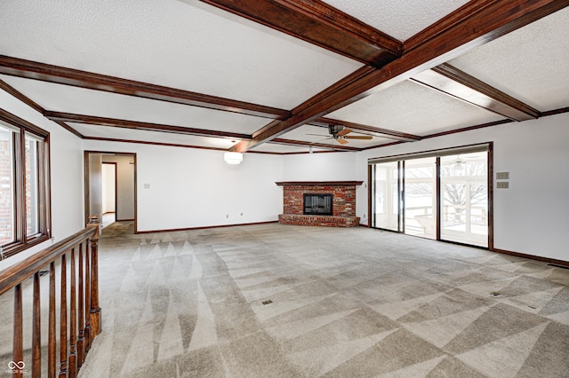 unfurnished living room featuring light carpet, beamed ceiling, baseboards, and ceiling fan