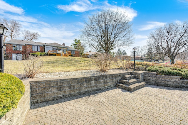 view of patio / terrace with a wooden deck