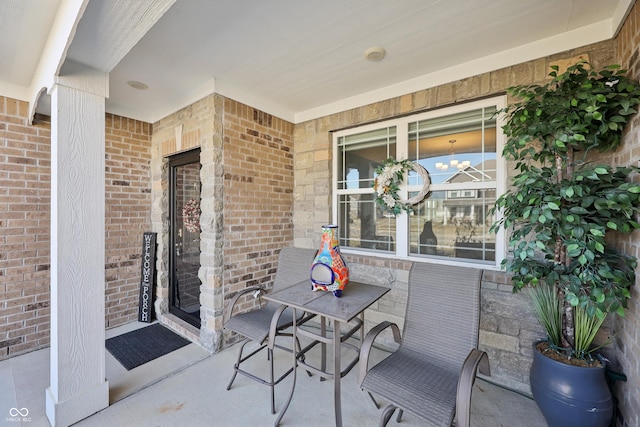 view of patio featuring outdoor dining area