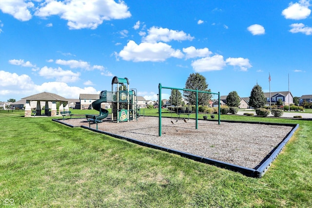 community jungle gym featuring a gazebo and a yard