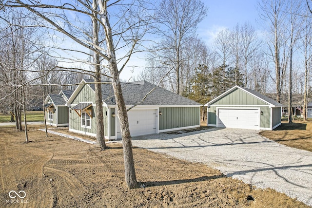 single story home featuring board and batten siding, a shingled roof, and a garage