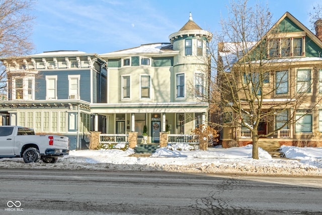 view of front of home featuring covered porch