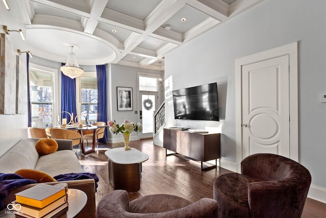 living area with coffered ceiling, baseboards, dark wood-style floors, beamed ceiling, and crown molding